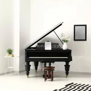 Piano movers in Denver safely relocating a piano.